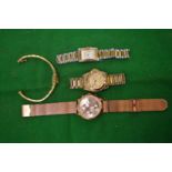 Four designer wrist watches.