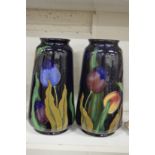 A pair of tulip decorated vases.