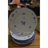 A set of six Meissen plates, blue painted with floral detail.