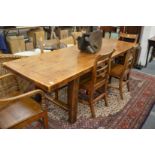 A good fruitwood slab top dining table 244cm x 82cm.