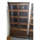 A Minty five section oak bookcase.