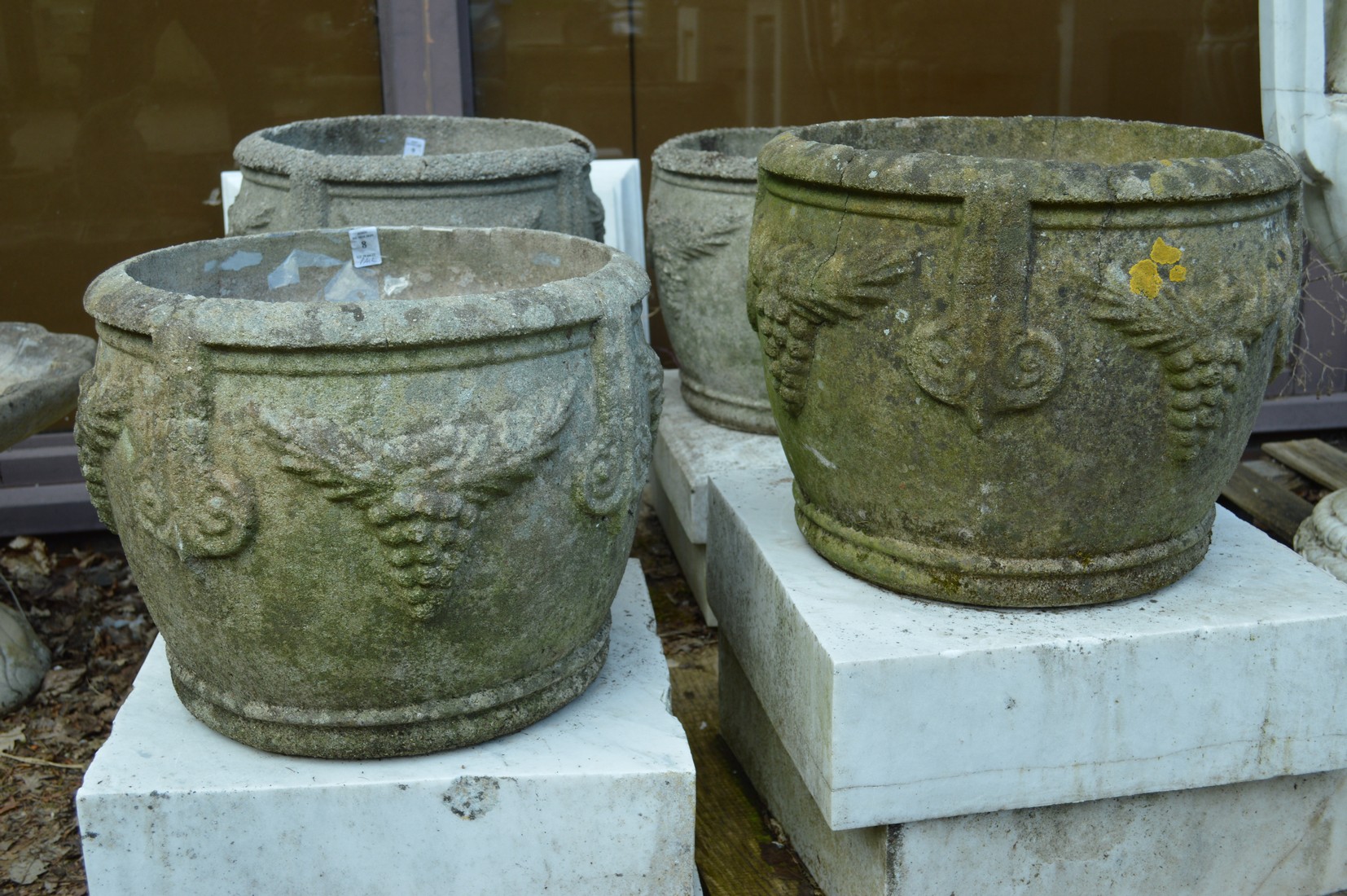 A pair of composite garden planters.