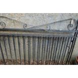 A pair of black painted wrought iron driveway gates each measuring 120cm high x 153cm wide.