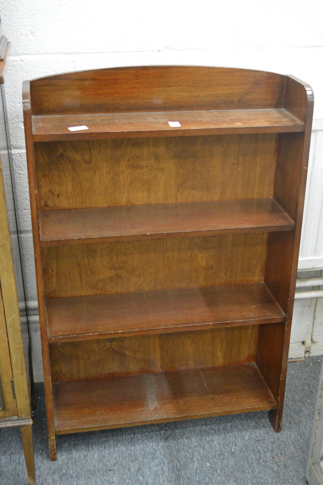 A mahogany open bookcase.