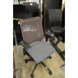 A stylish swivel office chair.