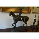 A good large bronze model of a horse and jockey.
