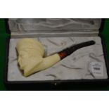 A boxed figural meerschaum pipe.