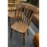 A beech and elm kitchen chair.