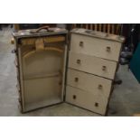 An old wardrobe trunk with Cunnard and other labels.