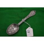 A cast pewter spoon.