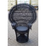 A wicker peacock chair.