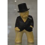 A Bovey Pottery Devon 'Our Gang' painted pottery model of Winston Churchill.