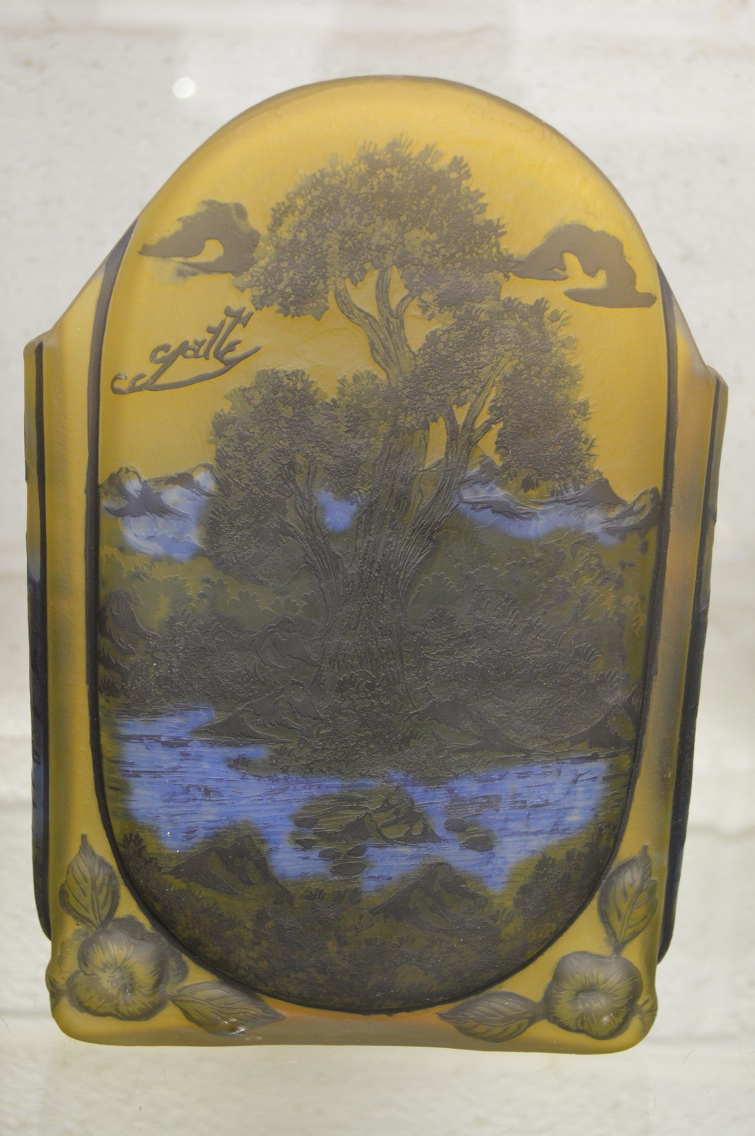 An Art Nouveau style iridescent slab form vase decorated with trees and a pond in a Galle style. - Image 2 of 4