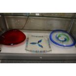 Three colourful glass dishes.