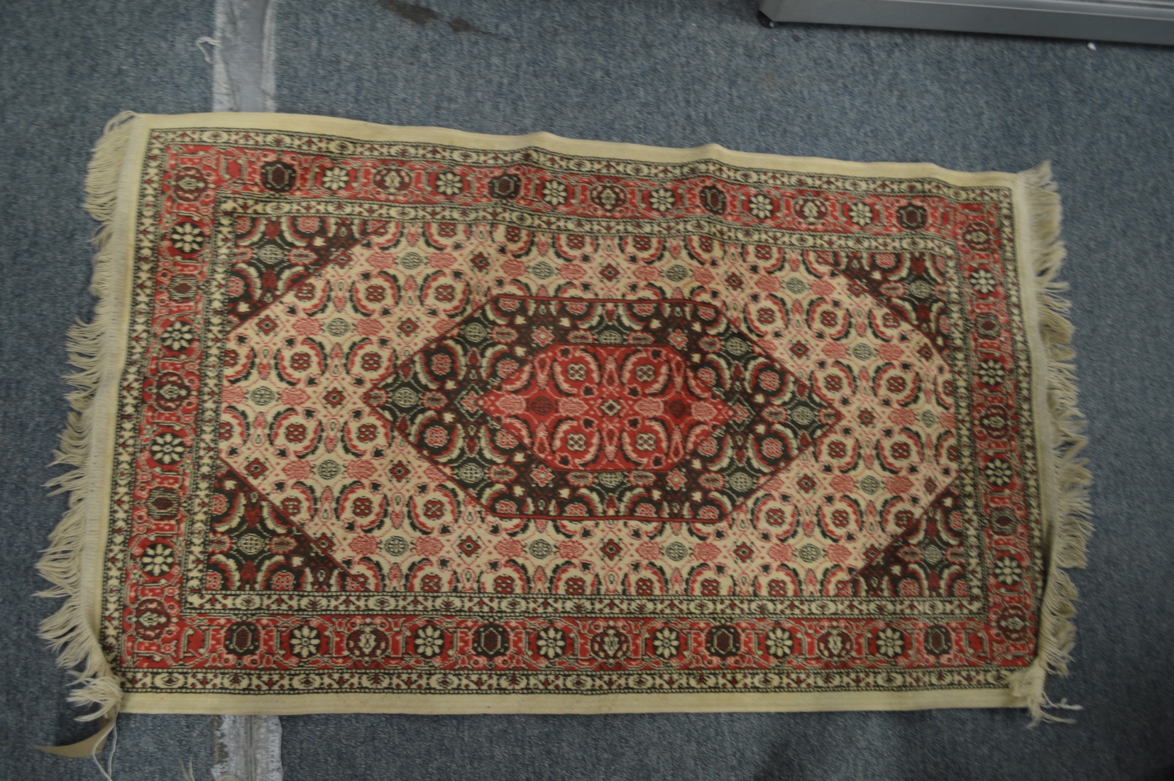 A Bokhara rug, 160cm x 105cm together with two small rugs. - Image 3 of 3