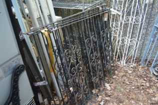 A set of four wrought iron railings/balustrades, three measuring 113cm x 92cm and one measuring 91cm