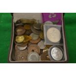 A box of various coins.