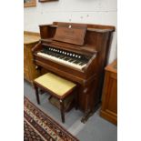 A Victorian walnut cased organ manufactured by The Gable Company, Chicago, USA.