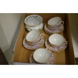 Decorative coffee cups and saucers and a Herend small bowl.