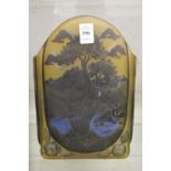 An Art Nouveau style iridescent slab form vase decorated with trees and a pond in a Galle style.