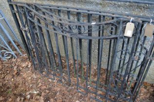 A pair of black painted wrought iron driveway gates each measuring 93cm high x 116cm wide.