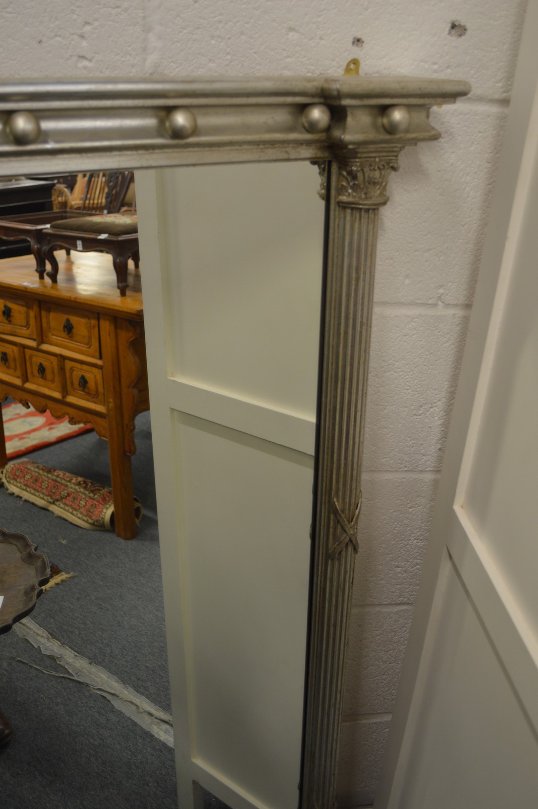 A large Regency style overmantle mirror with silver painted frame. - Image 2 of 2