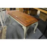 An Eastern brass inlaid hardwood and painted coffee table.