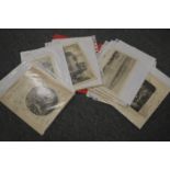 A folder of unframed engravings.