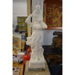 A good carved white marble figure of a young lady holding a young child above her shoulders.