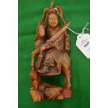 A good carved horn figure of a Chinese warrior on horse back.