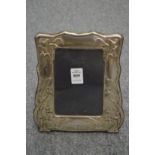 An Art Nouveau design silver photograph frame.