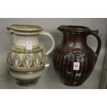 Mick and Leslie Dixon, Bartley Heath Pottery, a large dark glazed pottery jug together with