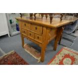 A Chinese soft wood altar table/chest of drawers.