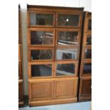 A Minty five section oak bookcase.