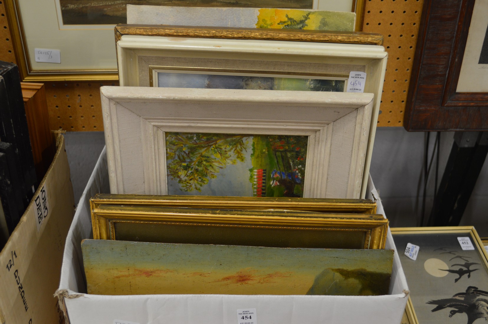 A small box of oil paintings.