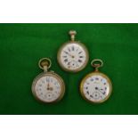 Three pocket watches.