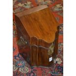 George III mahogany serpentine fronted cutlery box with fitted interior.