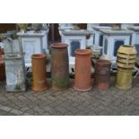 Six assorted chimney pots.