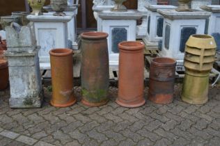 Six assorted chimney pots.