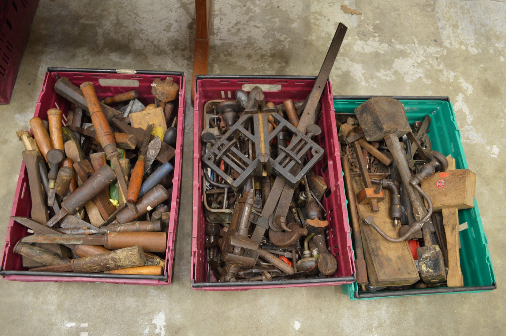 Three boxes of assorted wood working tools to include chisels etc.