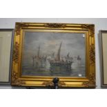 E Bott, fishing boats in a harbour, oil on canvas in a decorative gilt frame.