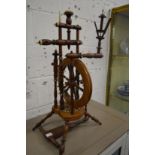 A good fruitwood and bone spinning wheel.
