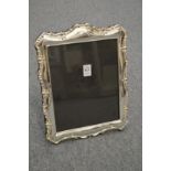 A large silver plated photograph frame.