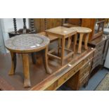 Two African bead work decorated stools and another stool.