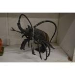 A good cast bronze model of a lobster.