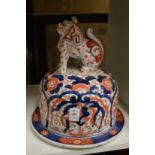 A large Imari jar lid with lion finial.