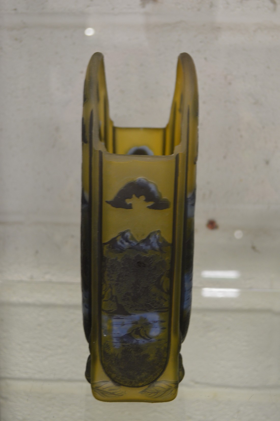 An Art Nouveau style iridescent slab form vase decorated with trees and a pond in a Galle style. - Image 4 of 4