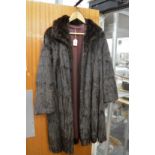 A ladies fur coat.