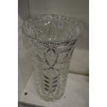 A large cut glass flower vase.