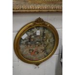 An etched circular mirror with gilt frame.